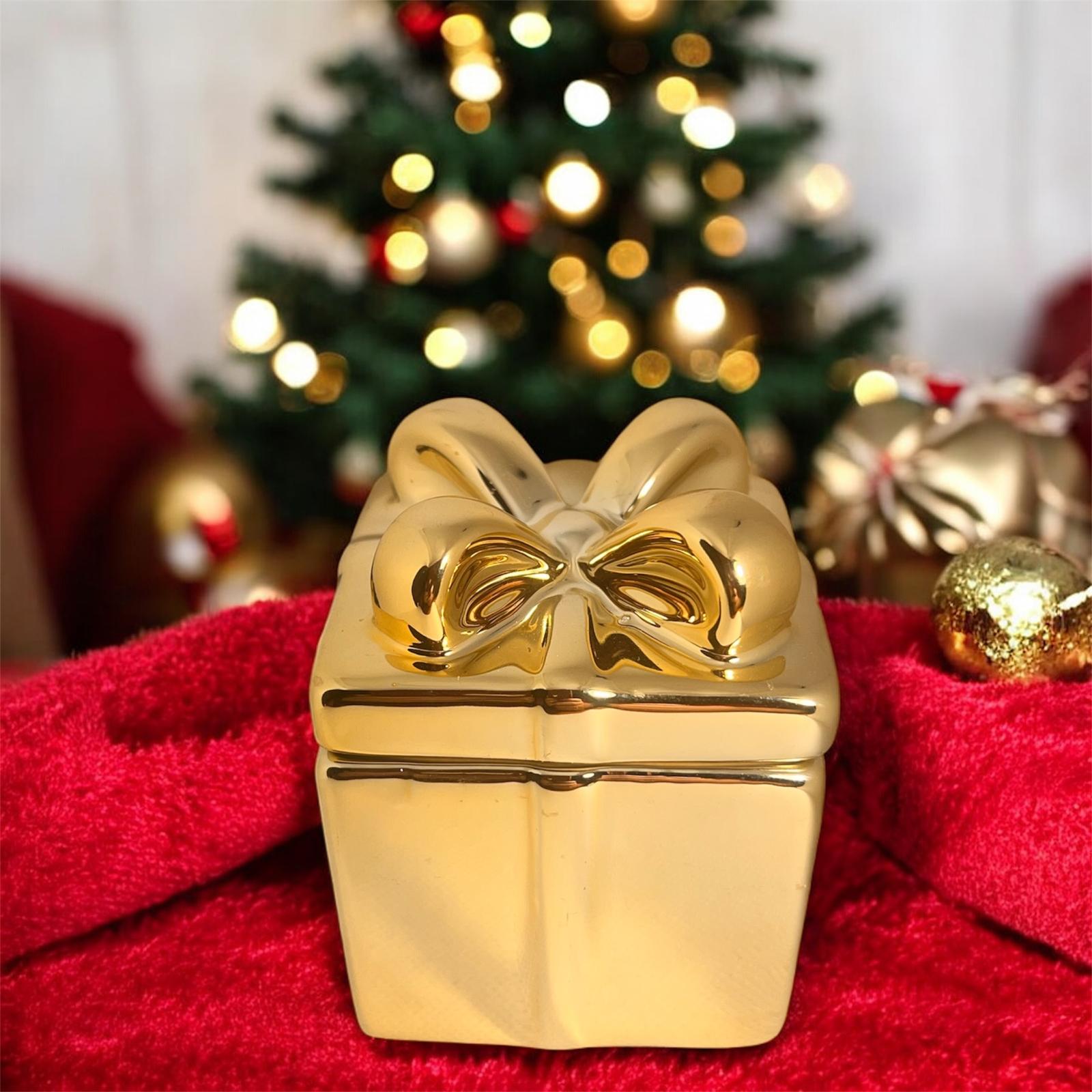 Świeczka zapachowa w pojemniku w kształcie prezentu